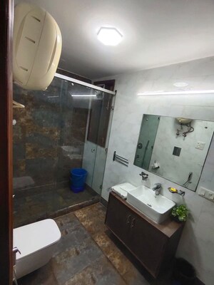 Bathroom in 4 BHK Builder Floor at South Extension I – for Rent