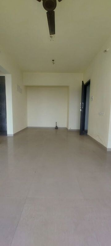 Living Room in 1 BHK Apartment at Man Opus, Mira Road – for Sale