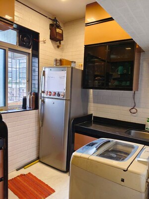 Kitchen in 1 BHK Apartment at Devdaya Nagar CHS, Shivai Nagar – for Sale