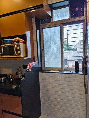 Kitchen in 1 BHK Apartment at Devdaya Nagar CHS, Shivai Nagar – for Sale