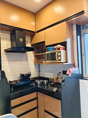 Kitchen in 1 BHK Apartment at Devdaya Nagar CHS, Shivai Nagar – for Sale