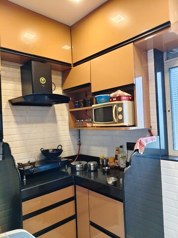 Kitchen in 1 BHK Apartment at Devdaya Nagar CHS, Shivai Nagar – for Sale
