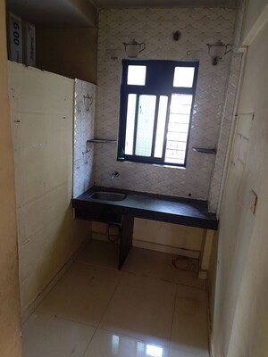 Kitchen in 1 BHK Apartment at Madhuri Society, Kalwa – for Rent