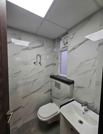 Bathroom in 2.5 BHK Builder Floor at Smart World Gems, Sector 89 – for Sale