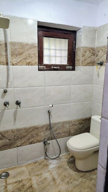 Bathroom in 2 BHK Apartment at Shatabdi Vihar, Sector 52 – for Rent