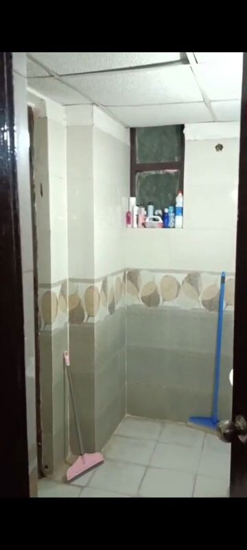 Bathroom in 2 BHK Apartment at Raj Nagar Extension – for Sale