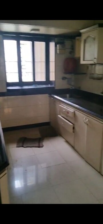 Kitchen in 3 BHK Apartment at Serenity Heights, Malad West – for Rent