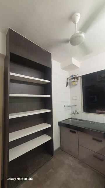 Kitchen in 1 BHK Apartment at Shiv Shakti Apartments Malad, Malad West – for Sale