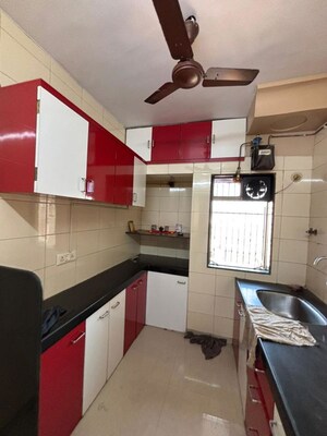 Kitchen in 2 BHK Apartment at Jambli Naka – for Sale