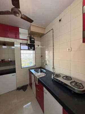 Kitchen in 2 BHK Apartment at Jambli Naka – for Sale