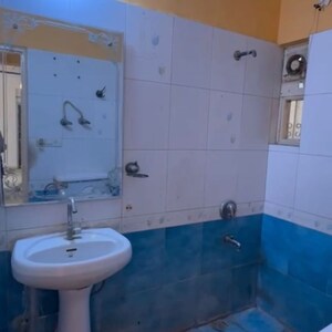 Bathroom in 2 BHK Apartment at Niho Jasmine Scottish Garden, Ashiana Greens – for Rent