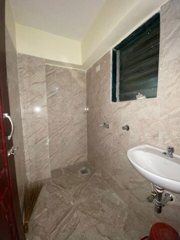 Bathroom in 1 BHK Apartment at Lodha Codename Golden Sunrise, Dombivli East – for Rent