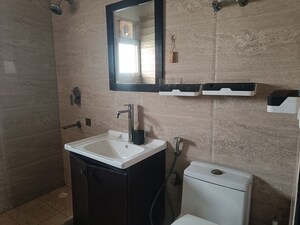 Bathroom in 2.5 BHK Apartment at Elite Golf Green, Sector 79 – for Rent