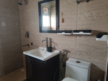 Bathroom in 2.5 BHK Apartment at Elite Golf Green, Sector 79 – for Rent