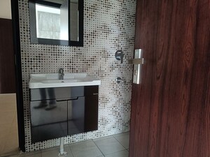 Bathroom in 2.5 BHK Apartment at Elite Golf Green, Sector 79 – for Rent