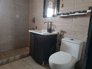 Bathroom in 2.5 BHK Apartment at Elite Golf Green, Sector 79 – for Rent