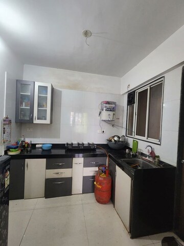 Kitchen in 2 BHK Apartment at Kohinoor Tinsel Town, Hinjewadi – for Rent