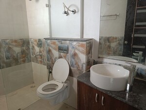 Bathroom in 3 BHK Apartment at Gaur Sportswood, Sector 79 – for Sale