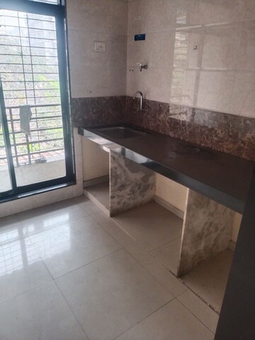 Kitchen in 2 BHK Apartment at Adinath Vinayak Solitaire, Karanjade – for Rent