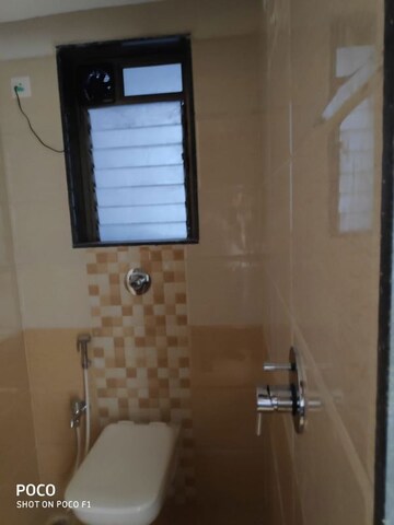 Bathroom in 2 BHK Apartment at Nakul Raj , Malad West – for Rent