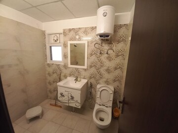Bathroom in 3 BHK Apartment at Elite Golf Green, Sector 79 – for Sale