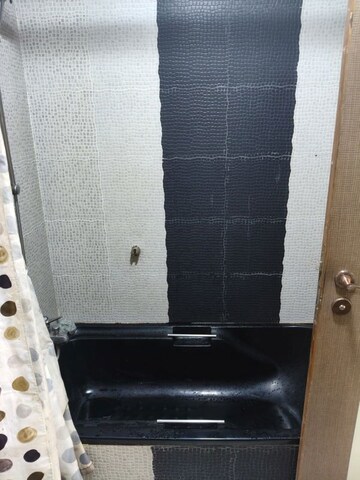 Bathroom in 3 BHK Apartment at Samartha Aangan, Andheri West – for Rent