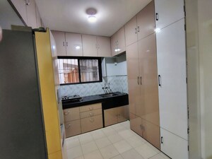 Kitchen in 3 BHK Apartment at Karan Gharonda, Wadgaon Sheri – for Rent