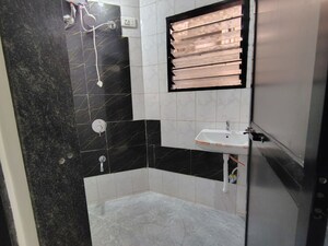 Bathroom in 3 BHK Apartment at Karan Gharonda, Wadgaon Sheri – for Rent