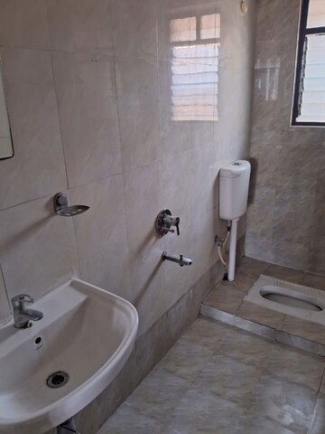 Bathroom in 2 BHK Apartment at JD Crystals, Lohgaon – for Rent