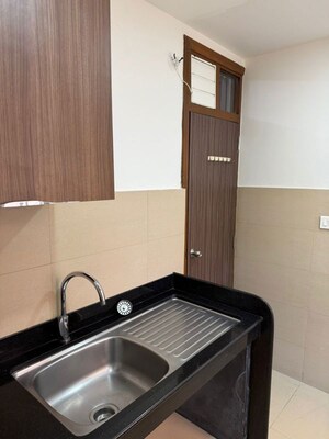 Kitchen in 3.5 BHK Apartment at K Raheja Vistas Premiere, Mohammadwadi – for Rent