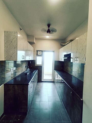 Kitchen in 3.5 BHK Apartment at Elite Golf Green, Sector 79 – for Rent