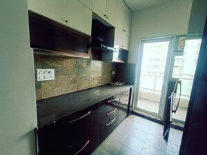 Kitchen in 3.5 BHK Apartment at Elite Golf Green, Sector 79 – for Rent