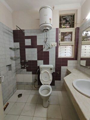 Bathroom in 1 BHK Builder Floor at Ansal Sushant Lok I, Sector 43 – for Rent