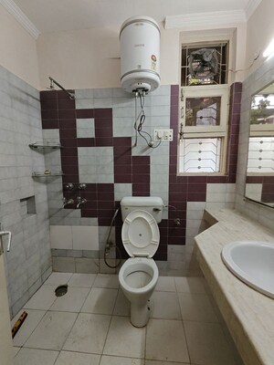 Bathroom in 1 BHK Builder Floor at Ansal Sushant Lok I, Sector 43 – for Rent