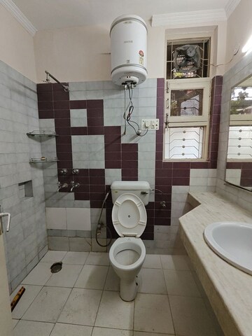 Bathroom in 1 BHK Builder Floor at Ansal Sushant Lok I, Sector 43 – for Rent