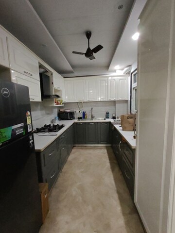 Kitchen in 4 BHK Builder Floor at Ansal Sushant Floors, Sushant Lok ii – for Rent