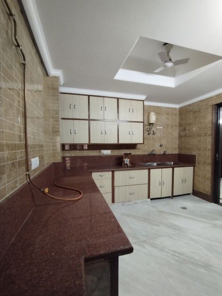 Kitchen, uday park 3 Bedroom 1953 Sq.Ft. Builder Floor In Uday Park Delhi 9848789