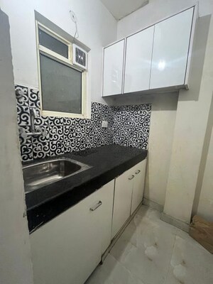 Kitchen in Studio Builder Floor at Minarch Tower, Sector 44 – for Rent