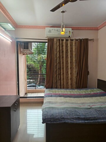 Living Room in 2 BHK Apartment at Oracle Sapphire CHS, Nerul – for Rent