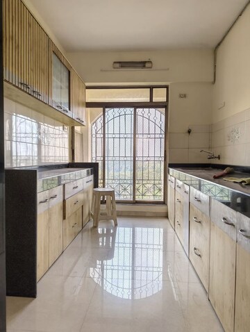 Kitchen in 2 BHK Apartment at Abrol House, Malad West – for Rent