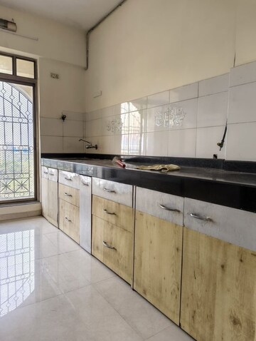 Kitchen in 2 BHK Apartment at Abrol House, Malad West – for Rent