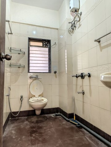 Bathroom in 2 BHK Apartment at Abrol House, Malad West – for Rent