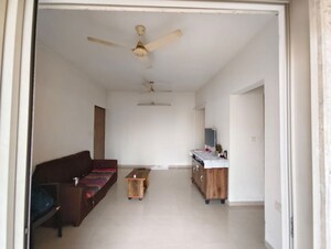 Living Room in 1 BHK Apartment at Lodha Casa Rio Gold, Dombivli East – for Rent