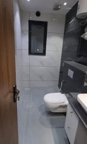 Bathroom in 4 BHK Apartment at Ansal API Versalia, Sector 67a – for Rent