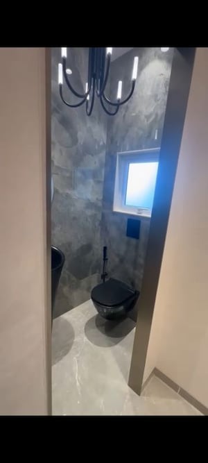 Bathroom in 1 BHK Apartment at Beauty Greenstone Heritage, Fort – for Sale