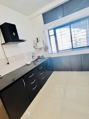 Kitchen in 2 BHK Apartment at Kumar Pebble Park, Hadapsar – for Sale