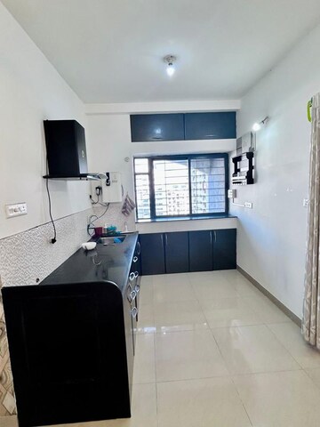 Kitchen in 2 BHK Apartment at Kumar Pebble Park, Hadapsar – for Sale