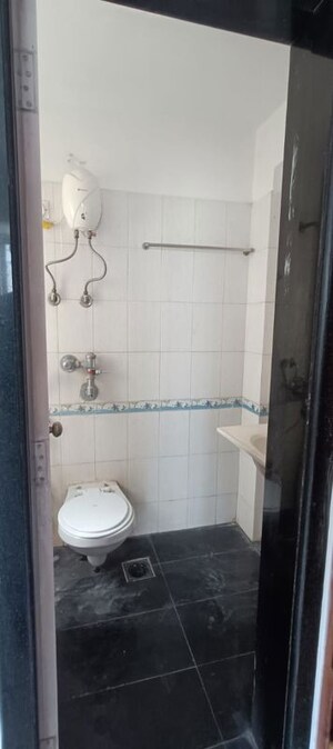 Master Bedroom in 2 BHK Apartment at Evershine Millennium Paradise, Kandivali East – for Rent