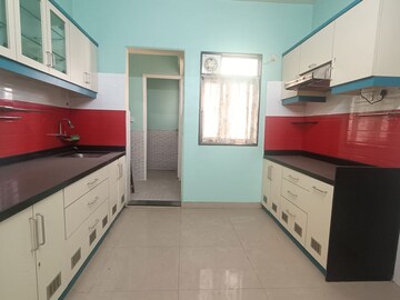 Kitchen in 2 BHK Apartment at Raviraj Park Island, Yerawada – for Rent