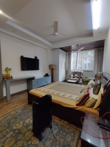 Bedroom in 4 BHK Builder Floor at Ansal API Esencia, Sector 67 – for Sale